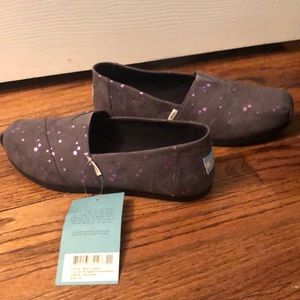New, TOMS “Forged Iron Foil Stars” w/ tags and box